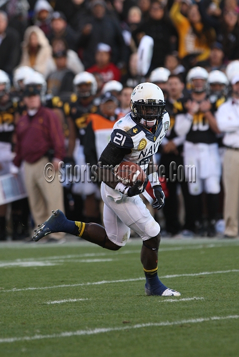 122912 Kraft SA-049.JPG - Dec 29, 2012; San Francisco, CA, USA; Navy Midshipmen Gee Gee Greene (21) returns a kickoff for a touchdown against the Arizona State Sun Devils in the 2012 Kraft Fighting Hunger Bowl at AT&T Park.